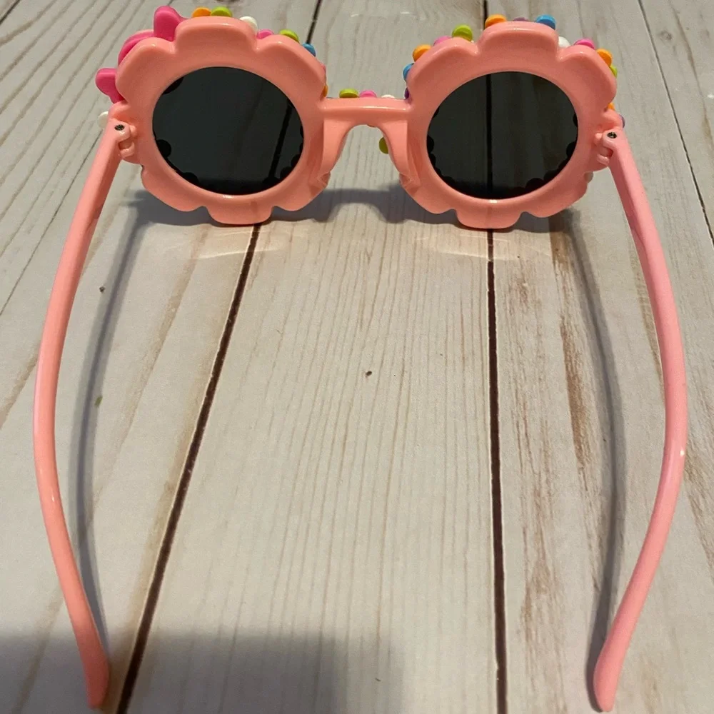Girls pink flower shaped sunglasses w candy